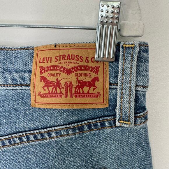 Levi's Ribcage Bell Jeans blown out knee Womens Size 33 - Picture 5 of 14